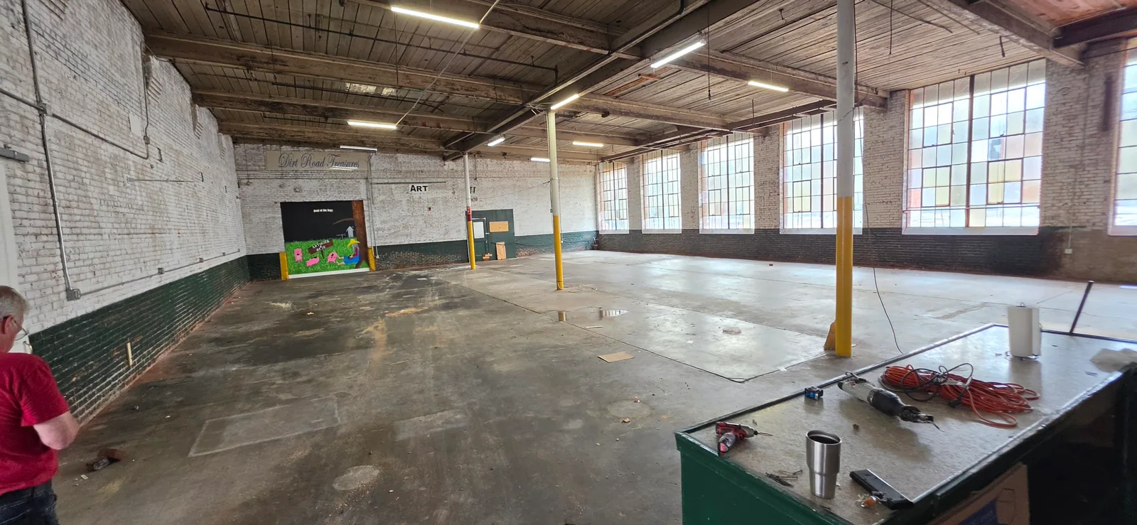 Cleared warehouse floor after a commercial cleanout in Southwest Virginia